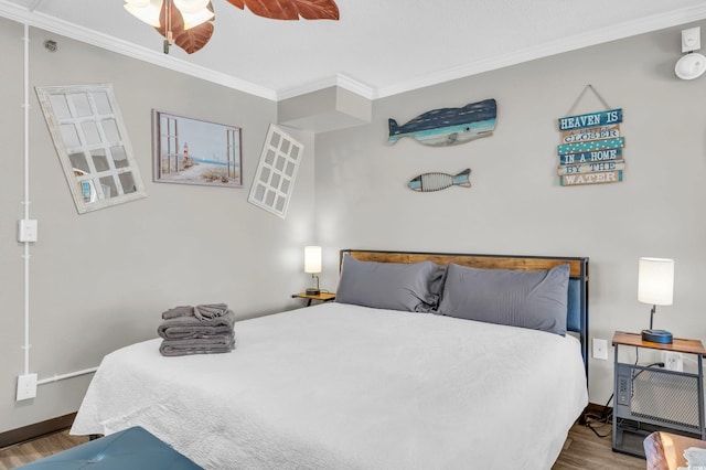 6900 N Ocean Blvd Unit 201, Myrtle Beach, SC 29572 - bedroom featuring wood finished floors, crown molding, and ceiling fan