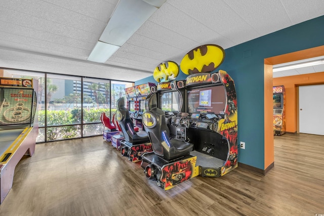 6900 N Ocean Blvd Unit 201, Myrtle Beach, SC 29572 - game room with floor to ceiling windows and wood finished floors