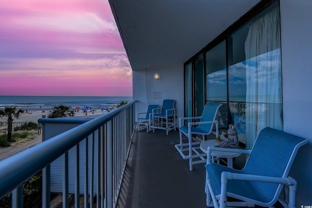 9550 Shore Dr Unit 225, Myrtle Beach, SC 29572 - balcony at dusk with a water view