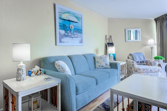 9550 Shore Dr Unit 225, Myrtle Beach, SC 29572 - living area with wood finished floors and a textured wall