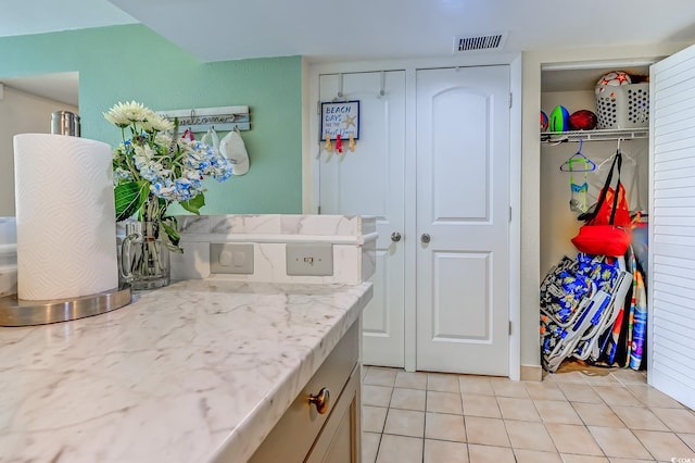 9550 Shore Dr Unit 225, Myrtle Beach, SC 29572 - washroom featuring light tile patterned floors