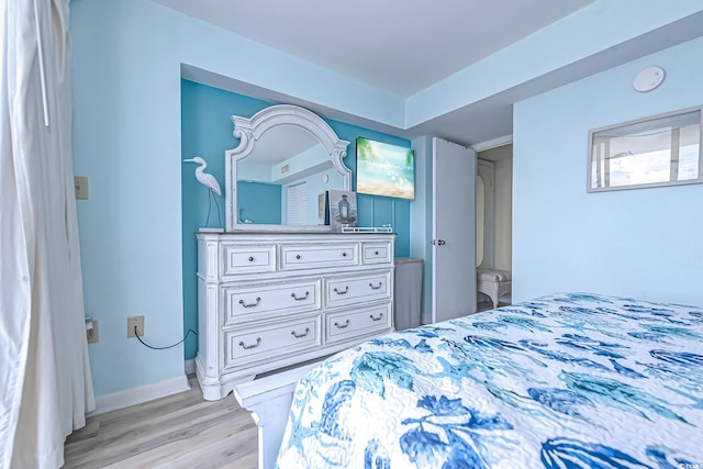 9550 Shore Dr Unit 225, Myrtle Beach, SC 29572 - bedroom featuring light wood finished floors and baseboards