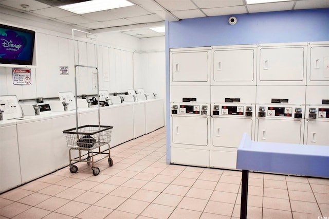 9550 Shore Dr Unit 225, Myrtle Beach, SC 29572 - community laundry room featuring estacked washer and dryer, light tile patterned flooring, and separate washer and dryer