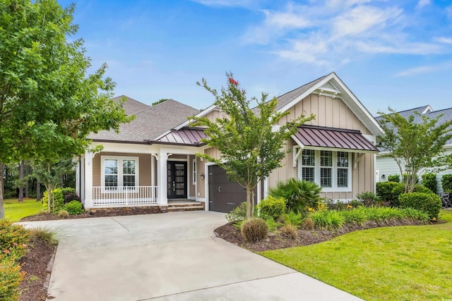 496 Starlit Way, Myrtle Beach, SC 29579 - craftsman inspired home with a standing seam roof, board and batten siding, french doors, and concrete driveway