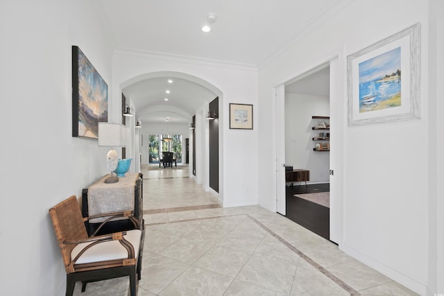 496 Starlit Way, Myrtle Beach, SC 29579 - hallway featuring arched walkways, ornamental molding, inlaid floor details, light tile patterned flooring, and recessed lighting