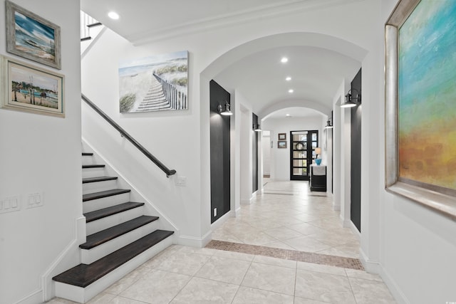 496 Starlit Way, Myrtle Beach, SC 29579 - hallway with arched walkways, recessed lighting, light tile patterned floors, stairway, and ornamental molding