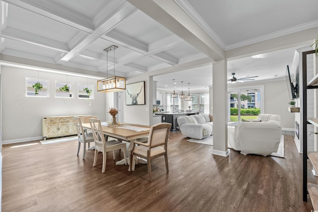 264 Switchgrass Loop, Little River, SC 29566 - dining space with a chandelier, beamed ceiling, dark wood-style floors, ornamental molding, and ceiling fan