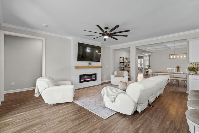 264 Switchgrass Loop, Little River, SC 29566 - living room featuring a fireplace, dark wood-style floors, crown molding, and ceiling fan