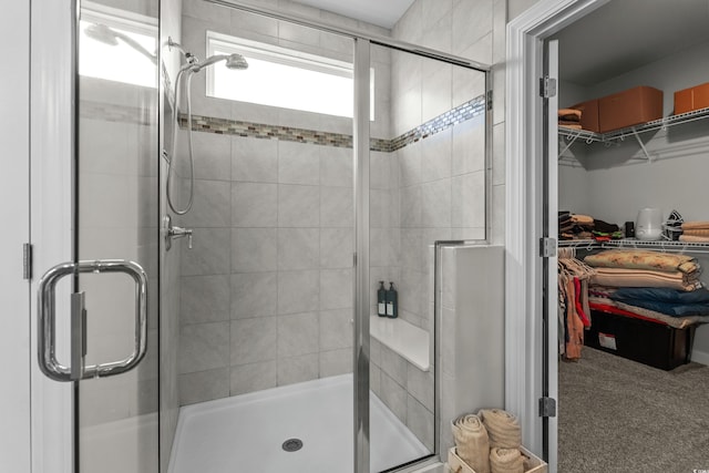 264 Switchgrass Loop, Little River, SC 29566 - full bathroom featuring a spacious closet and a shower stall