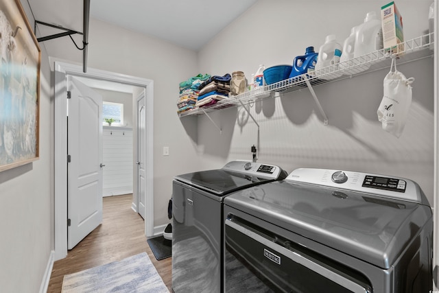 264 Switchgrass Loop, Little River, SC 29566 - washroom featuring washing machine and clothes dryer and light wood finished floors