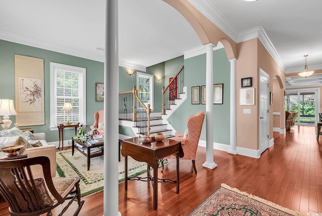128 Knotty Pine Way, Murrells Inlet, SC 29576 - living area featuring ornate columns, arched walkways, crown molding, and hardwood / wood-style flooring