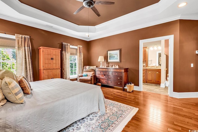 128 Knotty Pine Way, Murrells Inlet, SC 29576 - bedroom with a raised ceiling, crown molding, light wood finished floors, recessed lighting, and ensuite bath