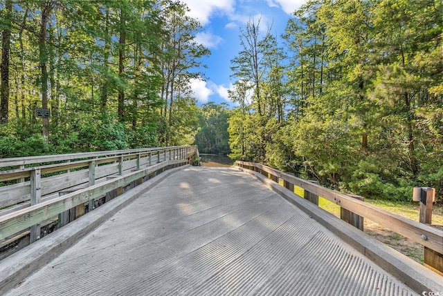 128 Knotty Pine Way, Murrells Inlet, SC 29576 - wooden deck featuring a view of trees