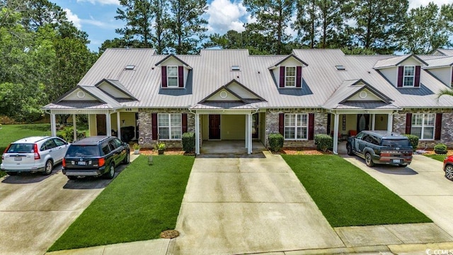 456 Colonial Trace Dr Unit 13-E, Longs, SC 29568 - view of front of property with concrete driveway, a front lawn, and stone siding