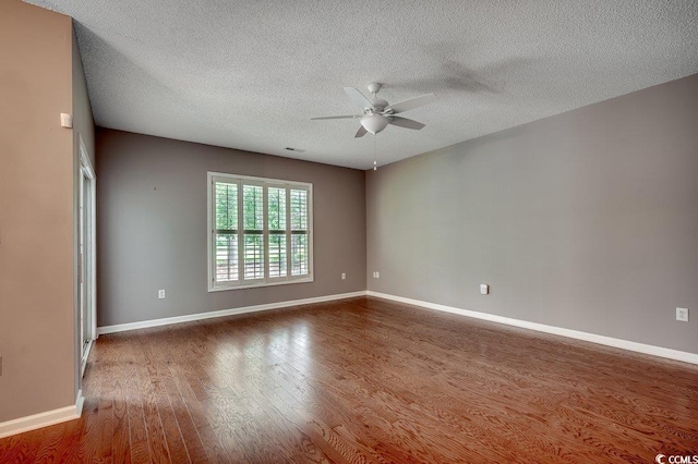 456 Colonial Trace Dr Unit 13-E, Longs, SC 29568 - spare room with a ceiling fan, wood finished floors, and a textured ceiling
