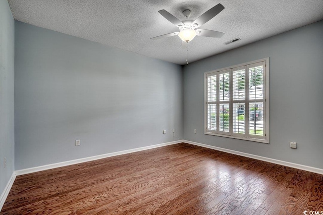 456 Colonial Trace Dr Unit 13-E, Longs, SC 29568 - unfurnished room featuring a textured ceiling, ceiling fan, and dark wood-type flooring