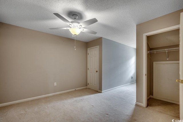 456 Colonial Trace Dr Unit 13-E, Longs, SC 29568 - unfurnished bedroom with light carpet, ceiling fan, and a textured ceiling
