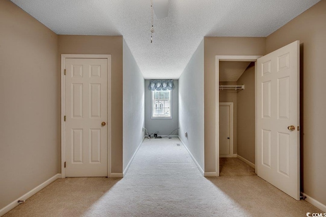 456 Colonial Trace Dr Unit 13-E, Longs, SC 29568 - hallway featuring carpet floors and a textured ceiling