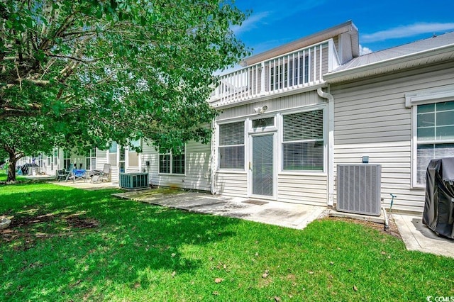 456 Colonial Trace Dr Unit 13-E, Longs, SC 29568 - back of house featuring a lawn and a patio