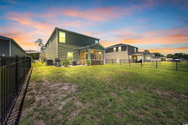 788 Dusty Pine Way, Myrtle Beach, SC 29588 - back of property featuring a sunroom and a fenced backyard