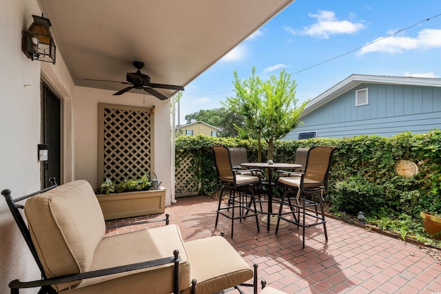 315 72nd Ave N Unit A, Myrtle Beach, SC 29572 - view of patio featuring a ceiling fan and outdoor dining area