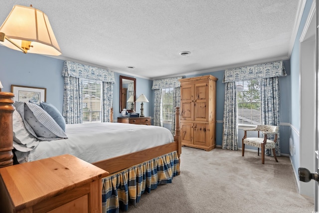 315 72nd Ave N Unit A, Myrtle Beach, SC 29572 - bedroom featuring crown molding, light carpet, and a textured ceiling