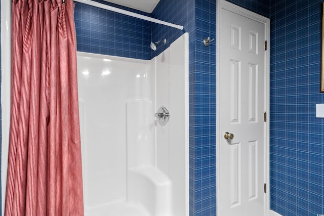315 72nd Ave N Unit A, Myrtle Beach, SC 29572 - bathroom featuring curtained shower and tile walls