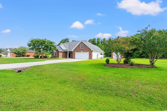 307 Russ Rd, Loris, SC 29569 - view of front of property featuring driveway, an attached garage, a front lawn, and brick siding