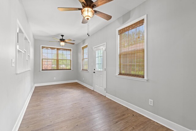 307 Russ Rd, Loris, SC 29569 - unfurnished room featuring a ceiling fan and wood finished floors