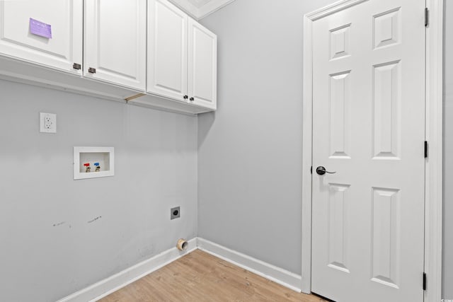 307 Russ Rd, Loris, SC 29569 - washroom featuring cabinet space, hookup for an electric dryer, light wood-style floors, and washer hookup