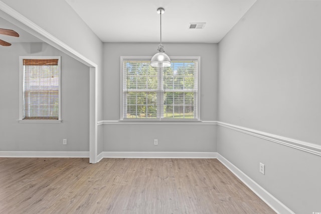 307 Russ Rd, Loris, SC 29569 - unfurnished dining area featuring light wood-style floors and ceiling fan