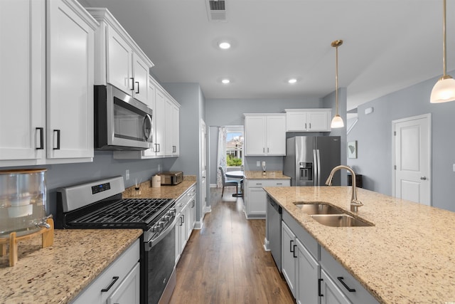 226 Calhoun Falls Dr, Myrtle Beach, SC 29579 - kitchen featuring stainless steel appliances, dark wood-style floors, hanging light fixtures, white cabinets, and recessed lighting