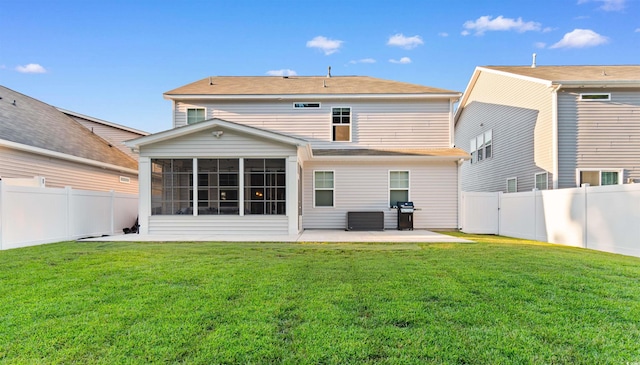 226 Calhoun Falls Dr, Myrtle Beach, SC 29579 - rear view of property featuring a sunroom, a patio, and a fenced backyard