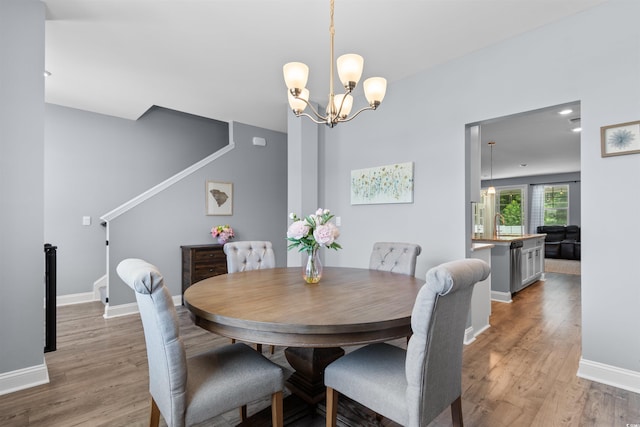 226 Calhoun Falls Dr, Myrtle Beach, SC 29579 - dining area with a chandelier and light wood finished floors