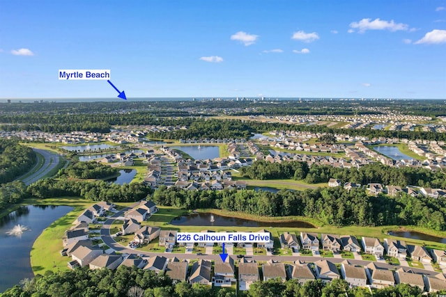 226 Calhoun Falls Dr, Myrtle Beach, SC 29579 - aerial view of property and surrounding area with nearby suburban area and a large body of water