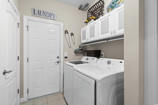 908 Ashbourn Ct, Murrells Inlet, SC 29576 - laundry room featuring independent washer and dryer, cabinet space, and light tile patterned floors