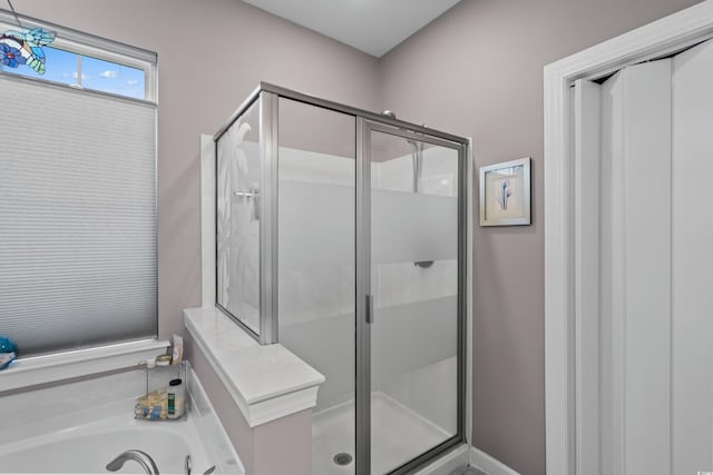 908 Ashbourn Ct, Murrells Inlet, SC 29576 - bathroom featuring a stall shower and a bath