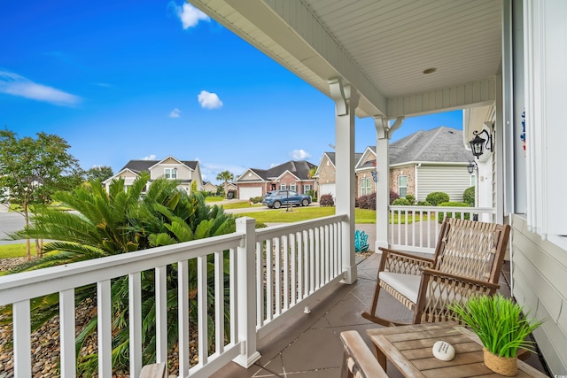 908 Ashbourn Ct, Murrells Inlet, SC 29576 - covered porch with a residential view