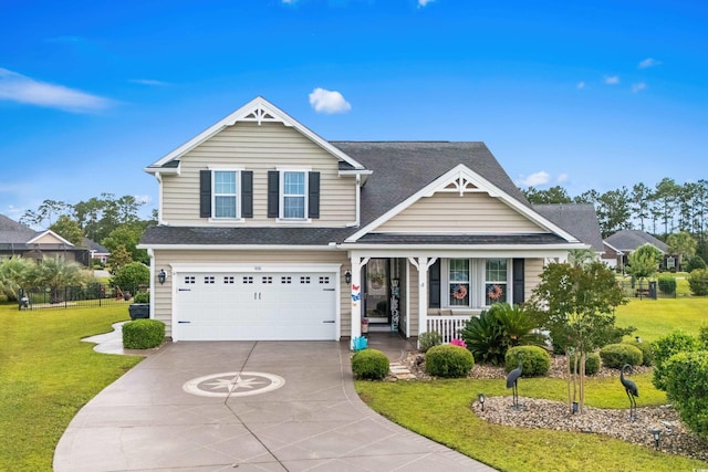 908 Ashbourn Ct, Murrells Inlet, SC 29576 - view of front of property featuring covered porch, a front yard, driveway, a garage, and a shingled roof