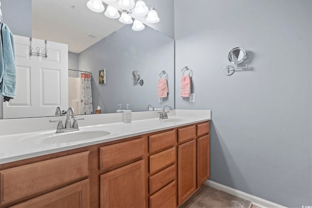 314 Black Oak Ln Unit 102, Murrells Inlet, SC 29576 - bathroom with double vanity, curtained shower, and tile patterned flooring