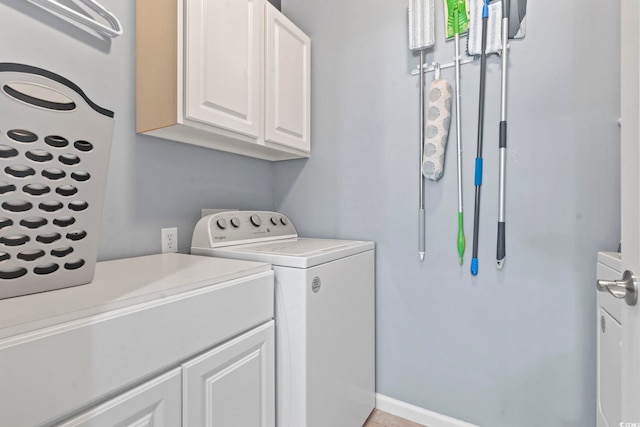 314 Black Oak Ln Unit 102, Murrells Inlet, SC 29576 - washroom with washer and dryer and cabinet space