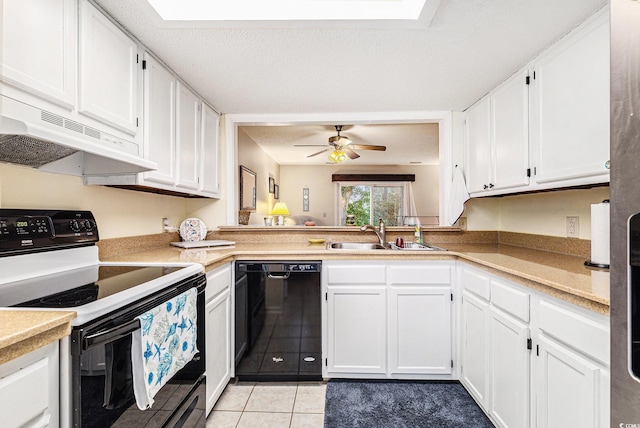 951 Plantation Dr Unit F1, Little River, SC 29566 - kitchen featuring range with electric cooktop, dishwasher, under cabinet range hood, light tile patterned flooring, and white cabinets