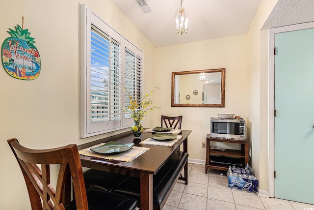 951 Plantation Dr Unit F1, Little River, SC 29566 - dining room featuring light tile patterned floors and baseboards