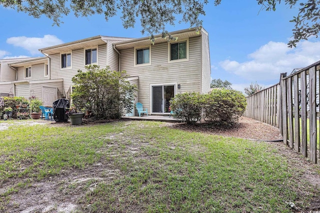 951 Plantation Dr Unit F1, Little River, SC 29566 - rear view of house with a fenced backyard