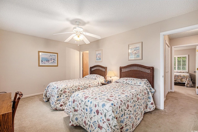 951 Plantation Dr Unit F1, Little River, SC 29566 - carpeted bedroom with ceiling fan and a textured ceiling