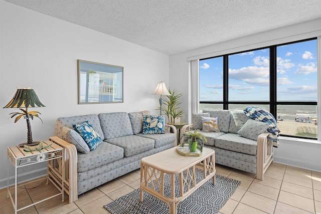523 S Ocean Blvd Unit 305, North Myrtle Beach, SC 29582 - living area with light tile patterned flooring and a textured ceiling