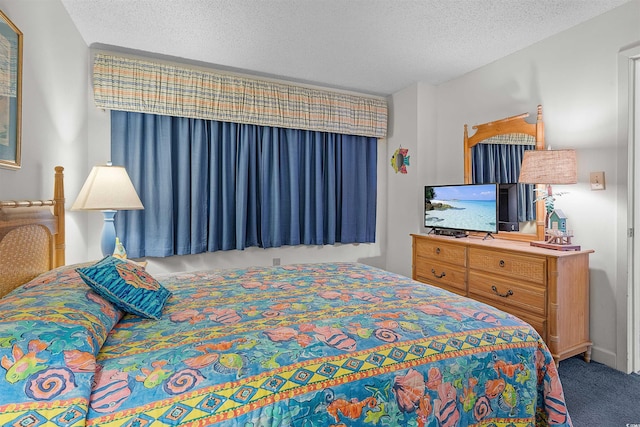 523 S Ocean Blvd Unit 305, North Myrtle Beach, SC 29582 - bedroom featuring a textured ceiling and carpet