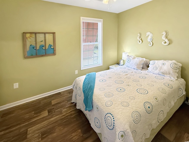 147 Weatherboard Ct, Pawleys Island, SC 29585 - bedroom with dark wood-type flooring and baseboards