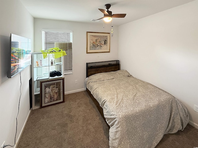 2021 Loblolly St, Georgetown, SC 29440 - carpeted bedroom with baseboards and ceiling fan