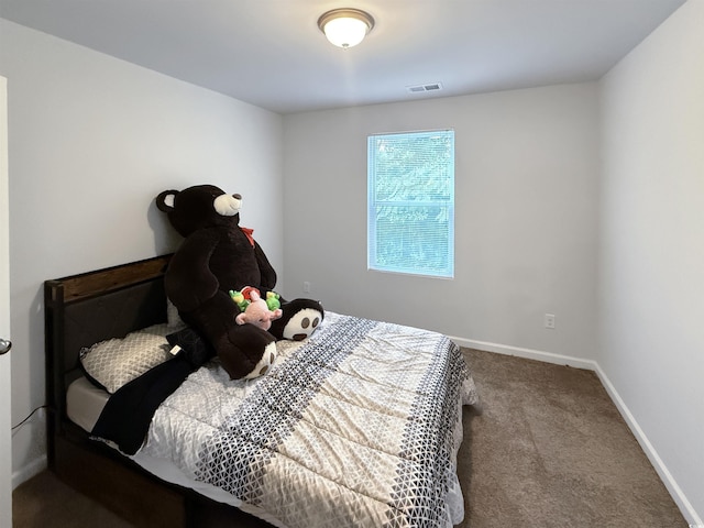2021 Loblolly St, Georgetown, SC 29440 - carpeted bedroom featuring baseboards